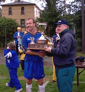 Bob receives Trophy
